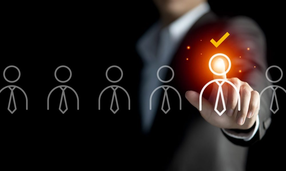 Businessman hand selecting  Job candidates recruitment hiring, Human Resources management concept, Employment head hunting and select job applicantsto working of the HR
